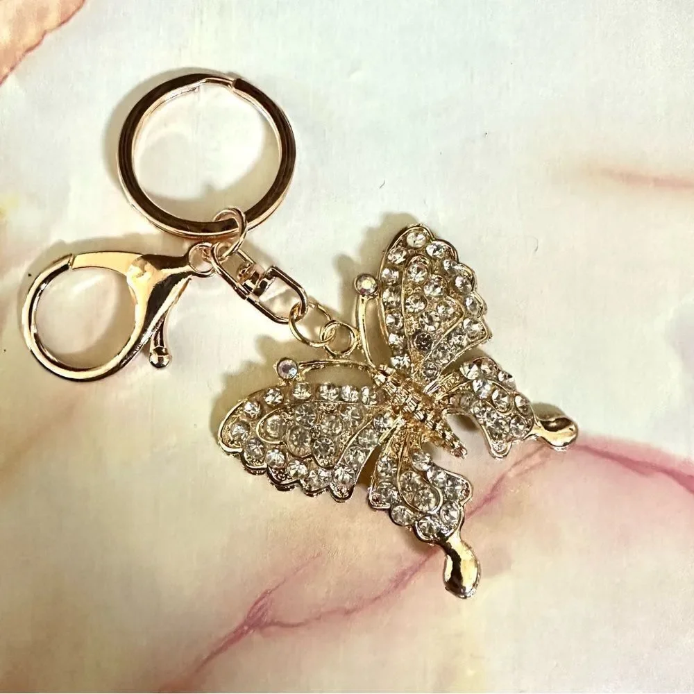 Gold tone butterfly rhinestone hang tag/keychain